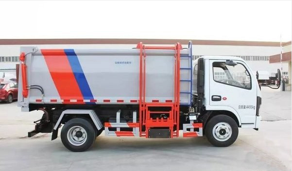side load compactor truck